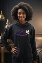 Load image into Gallery viewer, Cursive Be Merciful hoodie with matching dark interior background